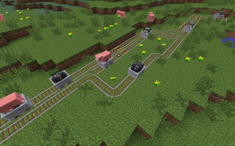 Plik:Wagoniki z spawnerem i dozownikiem.jpg